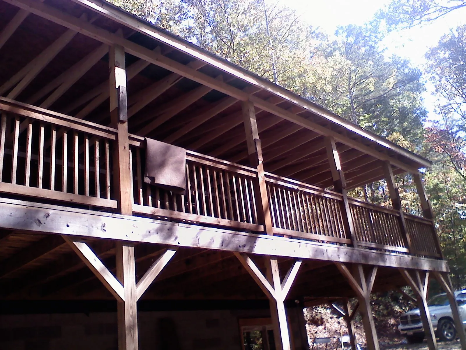 Timber framing under a new elevated porch and deck — Roof Leak Repair in Whitesville by Roofing Brothers